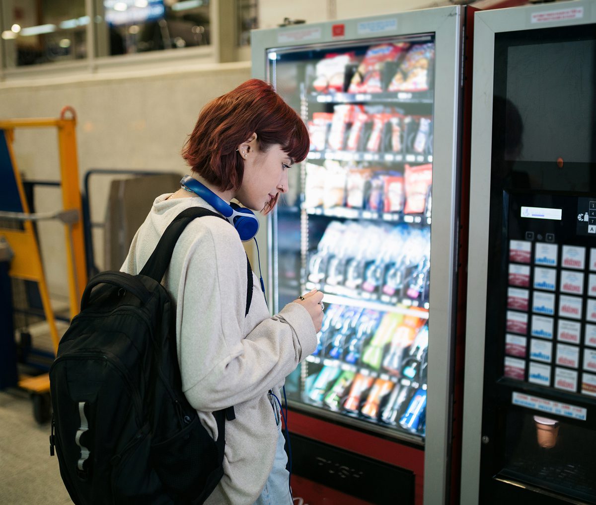 Traveler at a vending machine